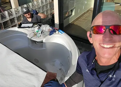 jason-and-son-working-on-a-hot-tub-repair-in-san-diego-california-together-cropped