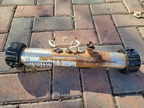 rusted hot tub heater repair due to low ph water in san diego california repair by jasons spa and repair